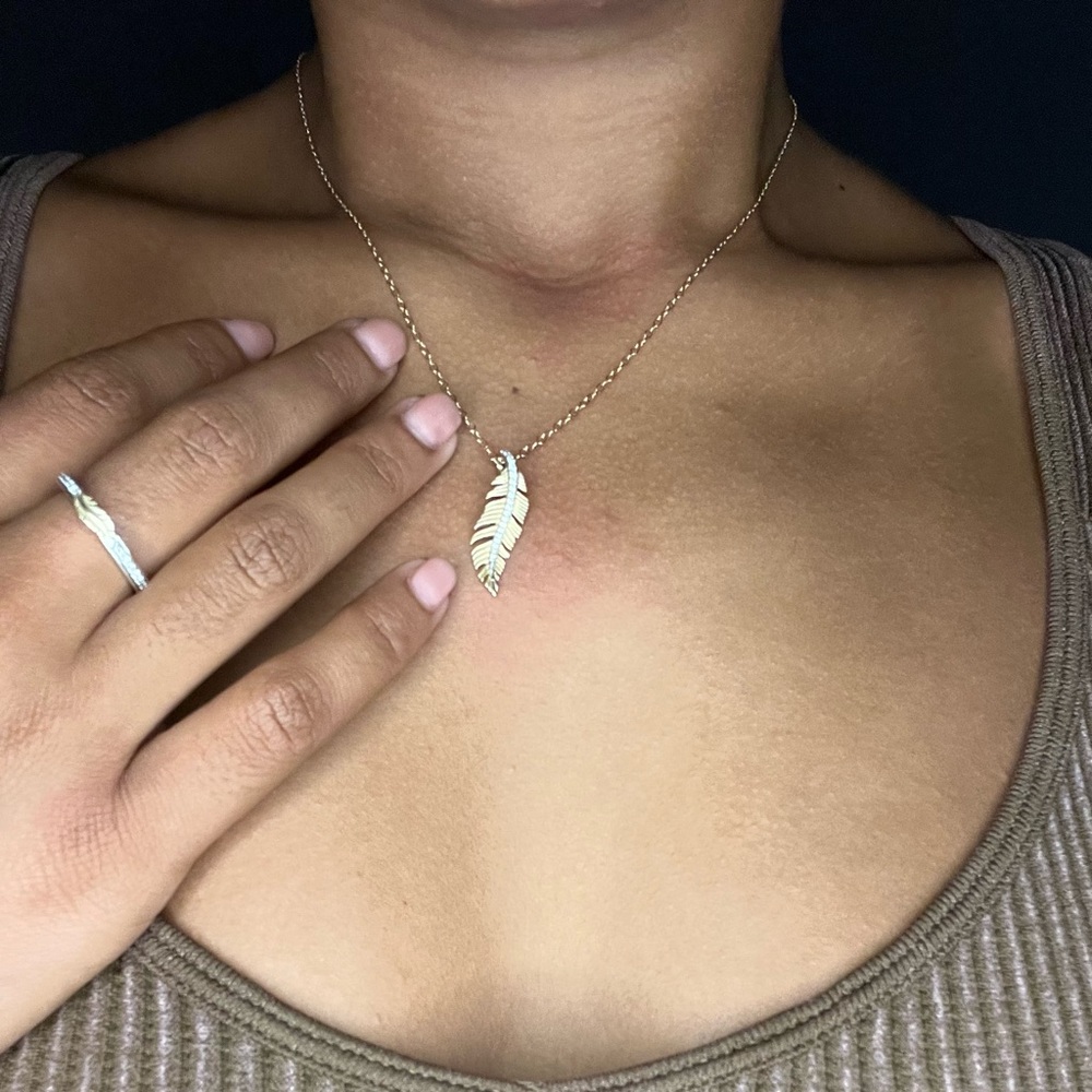 10K Gold Pocahontas necklace with real diamonds and matching ring.